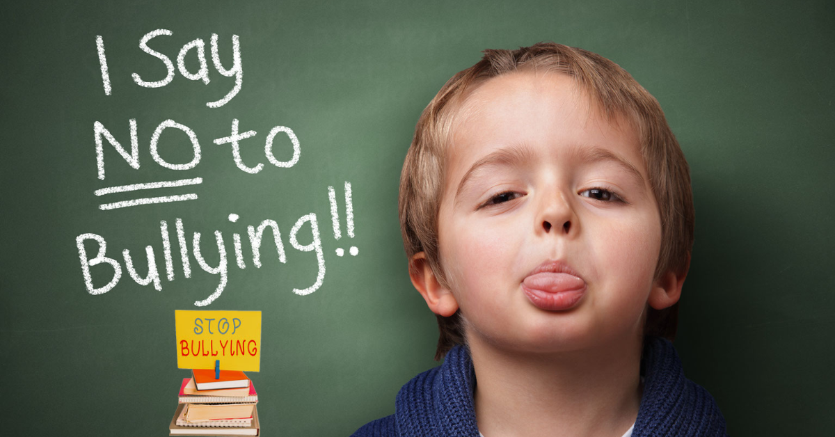 A young boy with a sign that says i say no bullying.