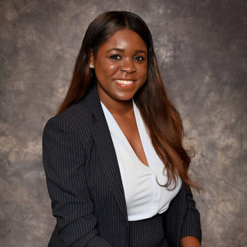 An african-american woman in a business suit.