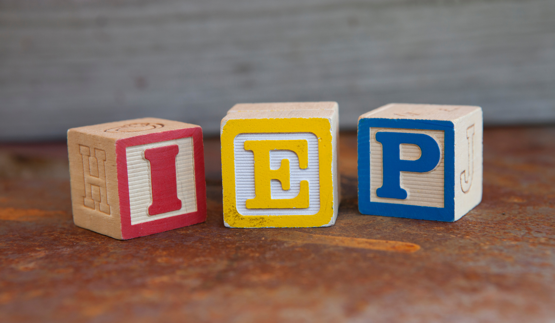 Letter blocks spelling out "IEP"