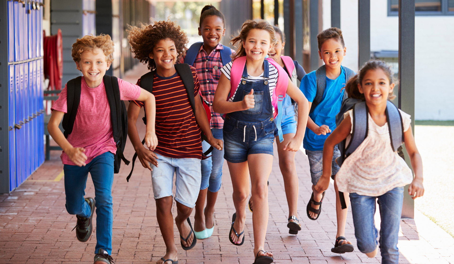 kids playing outside during summer school